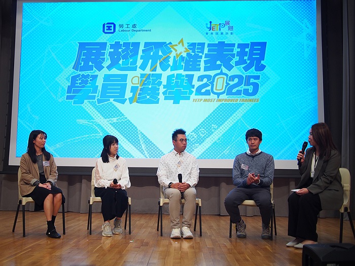 Awardees with guests, family and friends, employers and service providers taking photos together